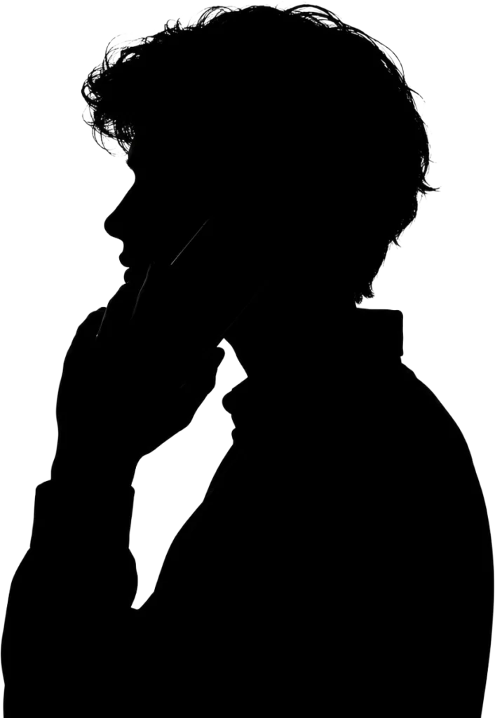 Silhouette of a person in profile holding a phone to their ear.