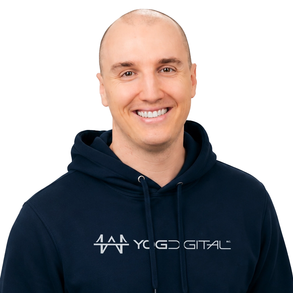 Smiling bald man in a navy hoodie with a 'YOGD DIGITAL' logo across the chest.